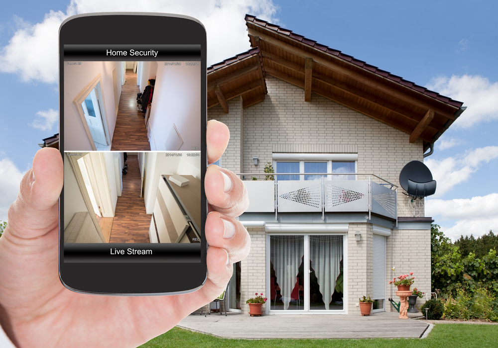 Phone monitoring home security cameras