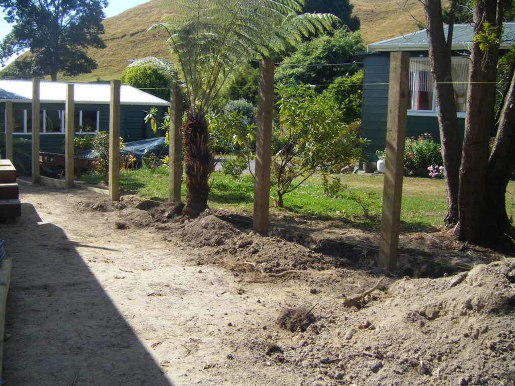 new fence in the process of being built