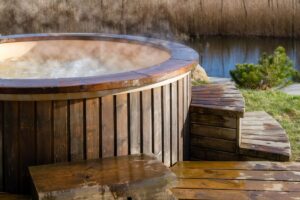 round wooden spa pool