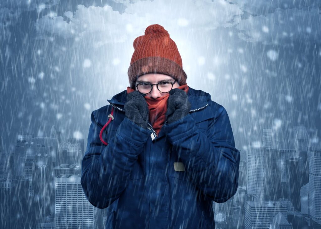 young man rugged up against cold weather